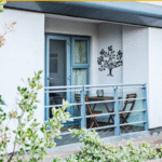 Modern apartment building exterior with balcony and garden view, Centrium, Woking