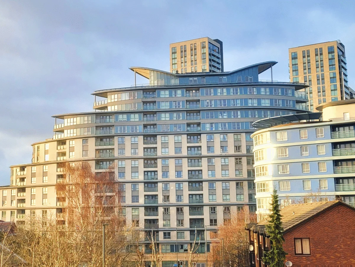 Daytime view of Centrium apartment complex exterior, showing distinctive modern architecture in Woking
